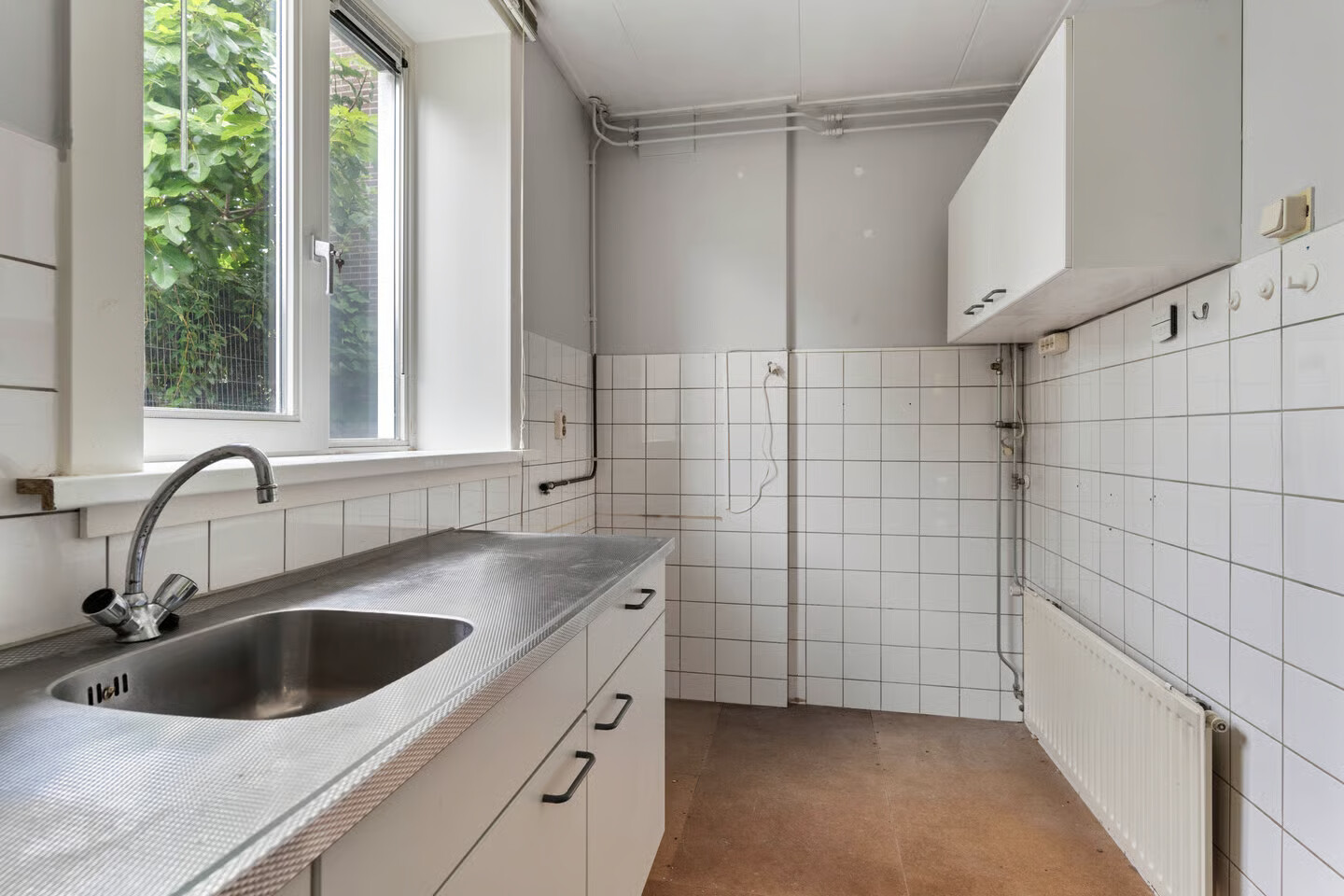 Tussenwoning te koop: Drusiushof 11, Amsterdam