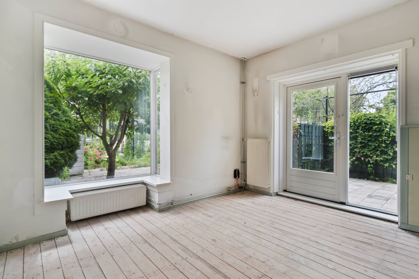 Tussenwoning te koop: Drusiushof 11, Amsterdam