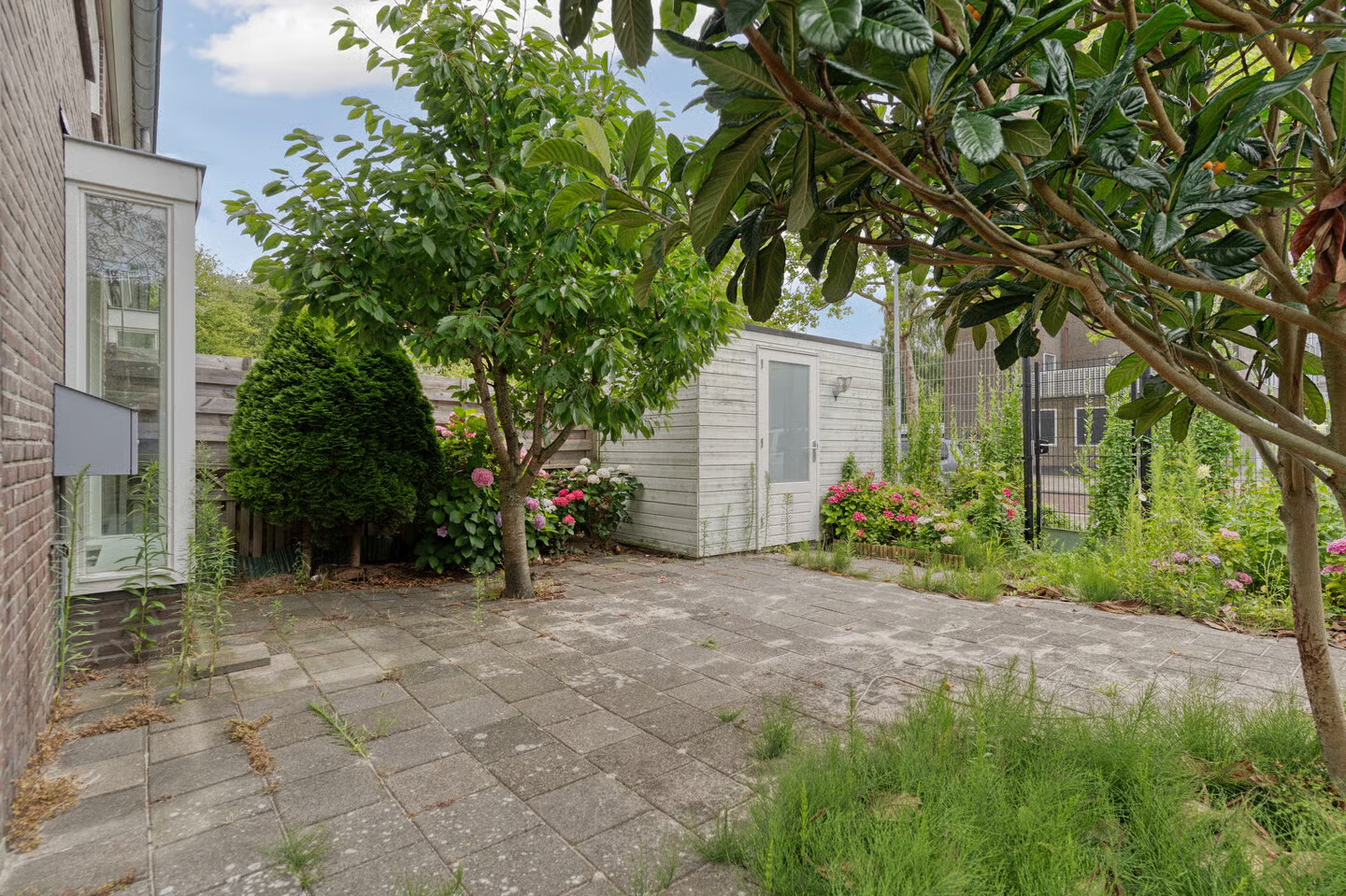 Tussenwoning te koop: Drusiushof 11, Amsterdam