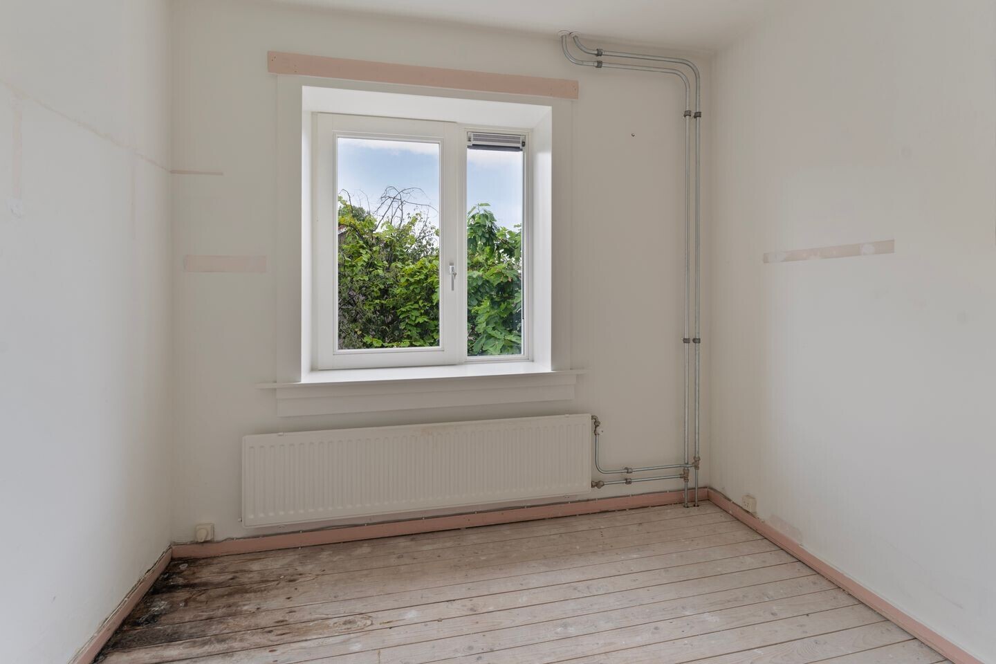 Tussenwoning te koop: Drusiushof 11, Amsterdam