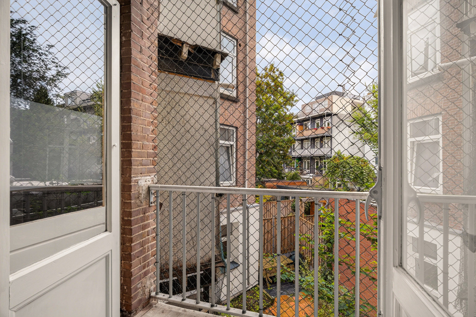 Appartement te koop: Molukkenstraat 67-1, Amsterdam