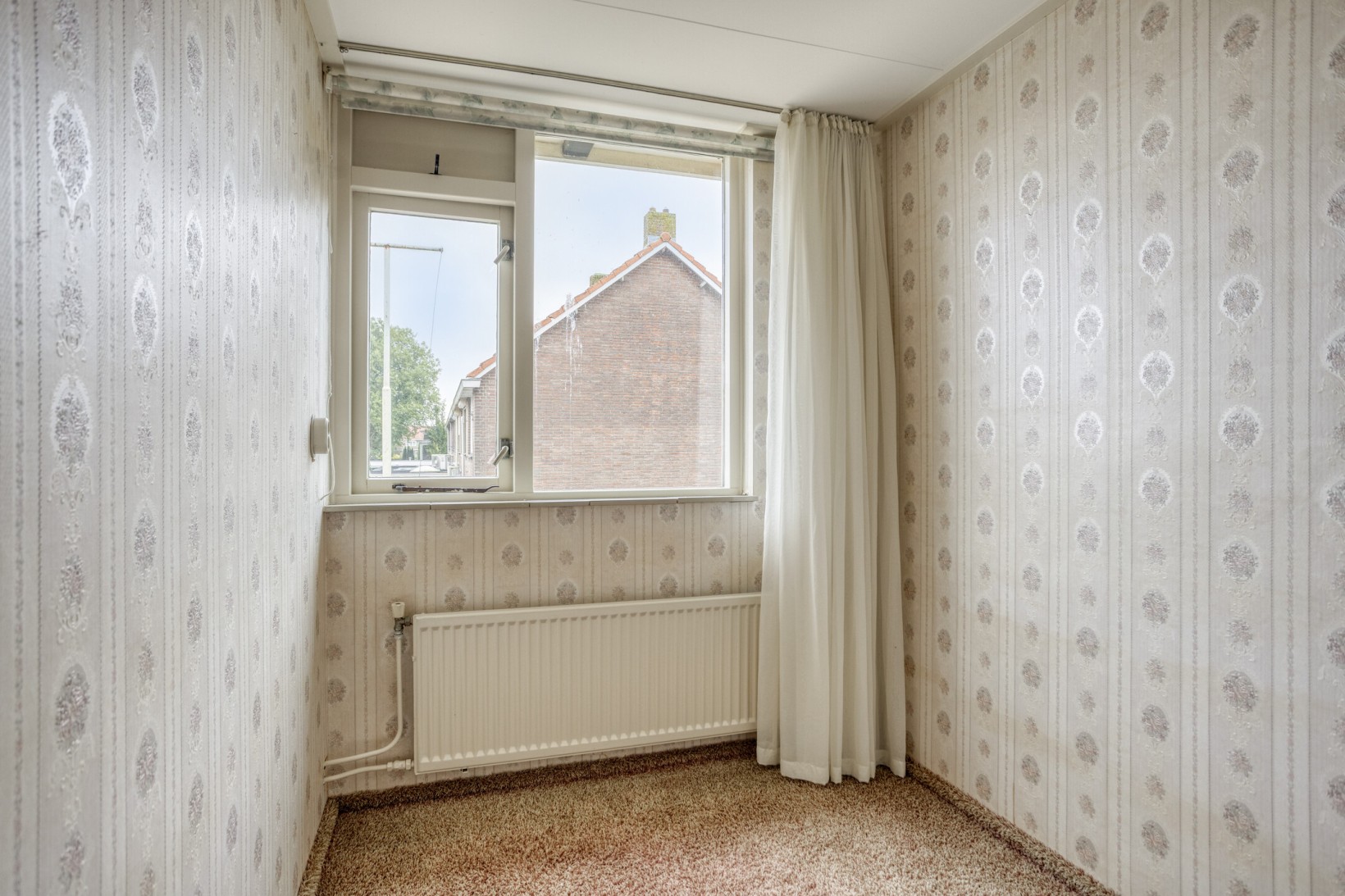 Tussenwoning te koop: Urkerstraat 6, Volendam