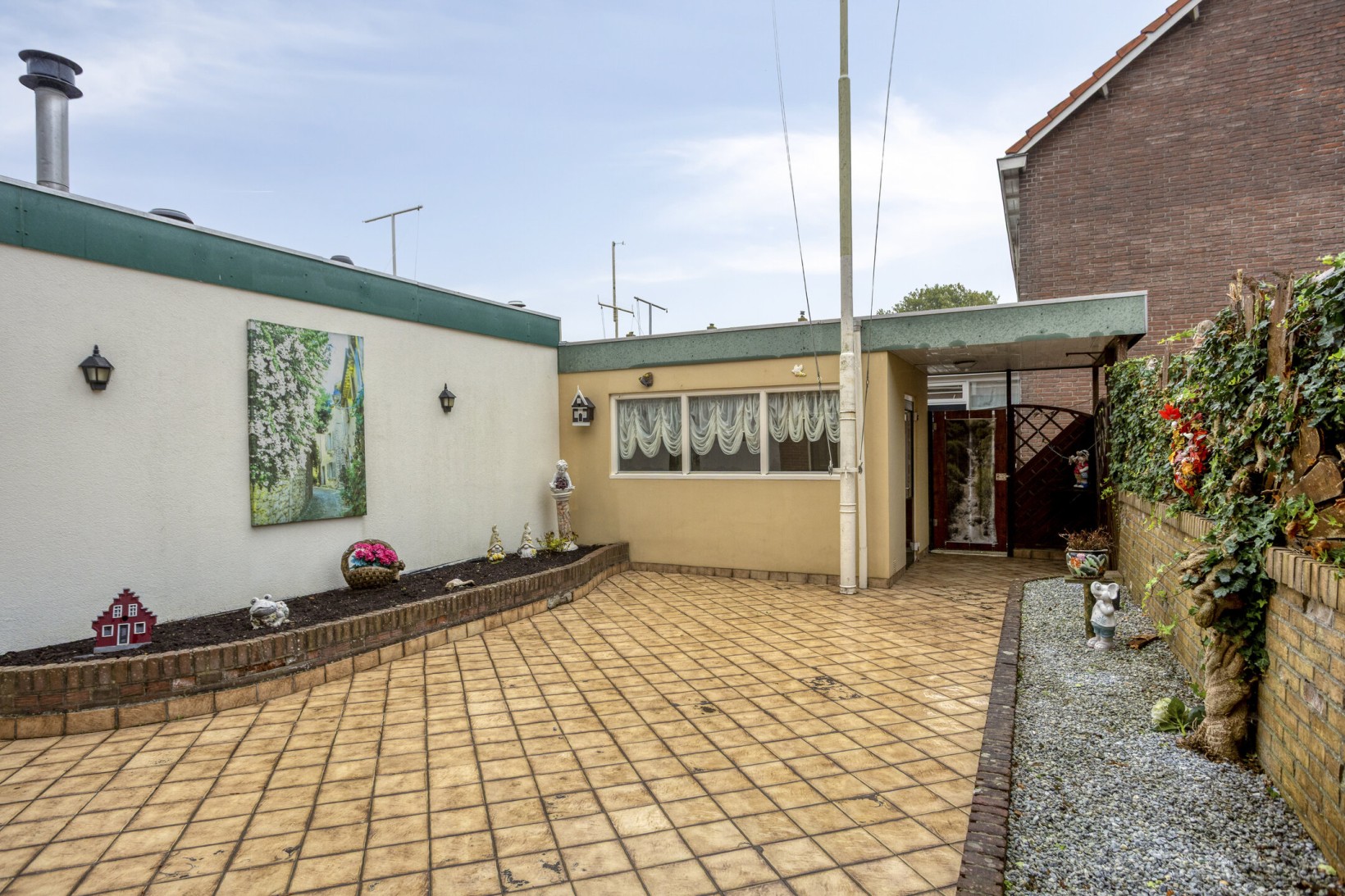 Tussenwoning te koop: Urkerstraat 6, Volendam