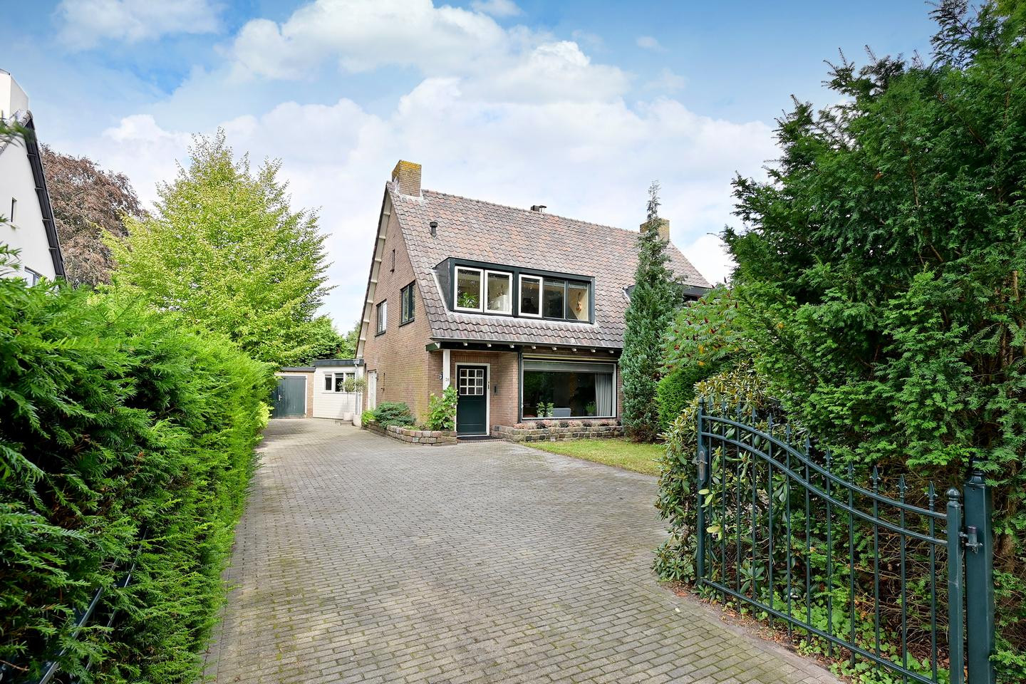 Tussenwoning te koop: Heideveldweg 31, Laren