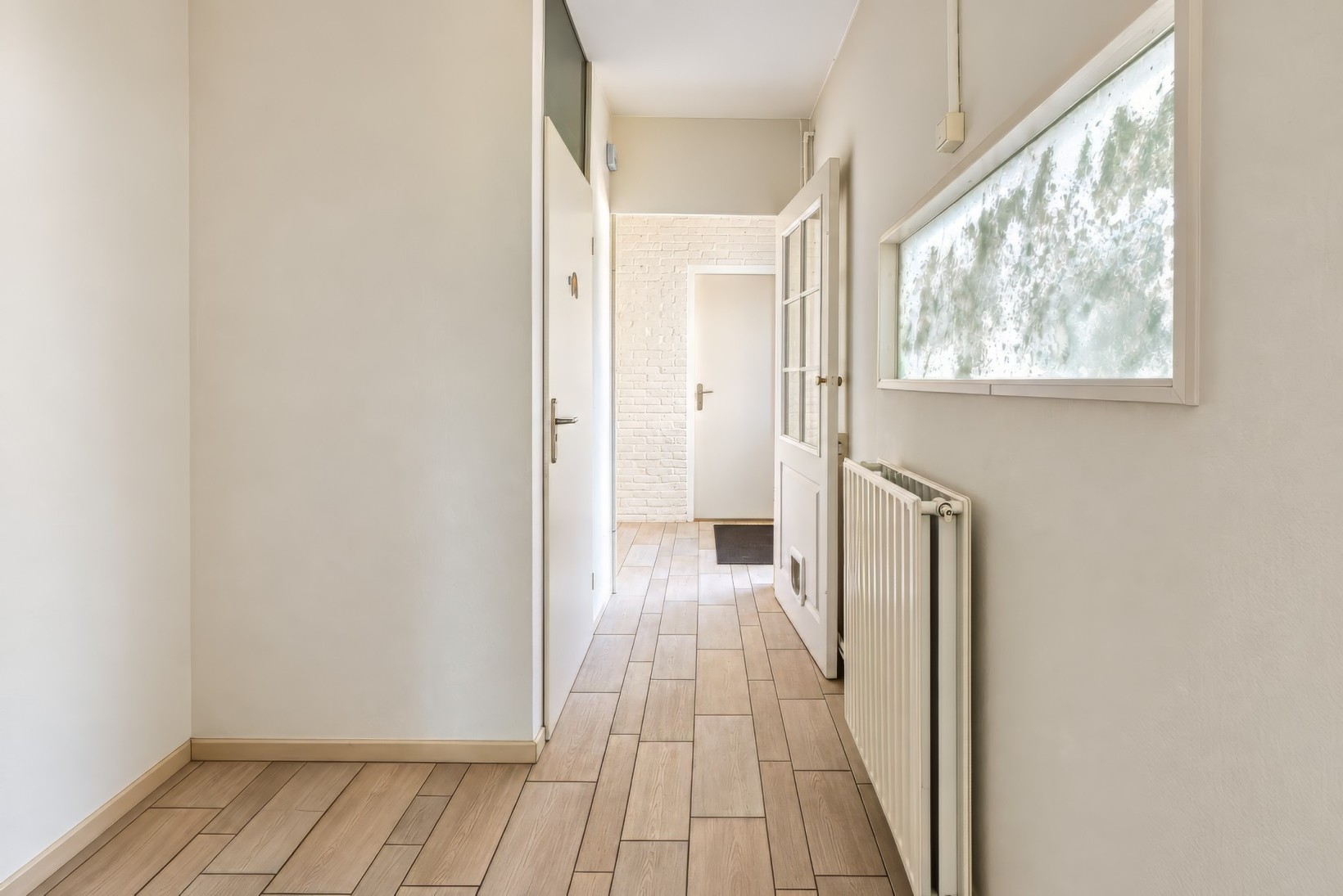Tussenwoning te koop: Weegbree 12, Huizen