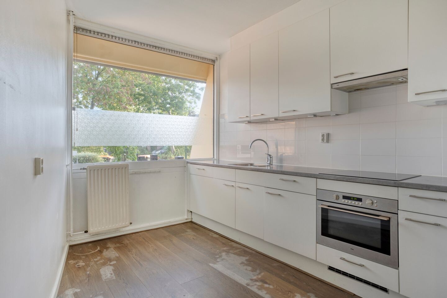 Tussenwoning te koop: Wikke 52, Huizen