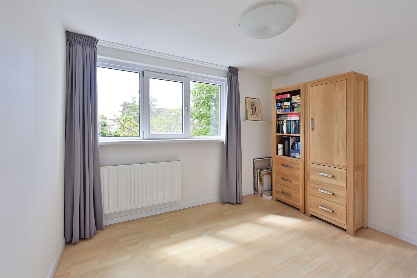Tussenwoning te koop: Hoofdweg 50, Huizen