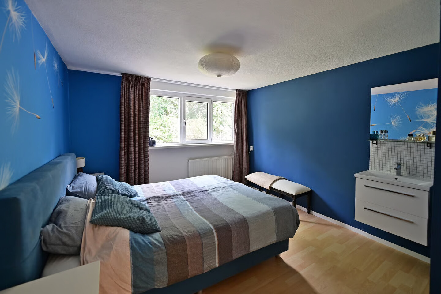 Tussenwoning te koop: Hoofdweg 50, Huizen