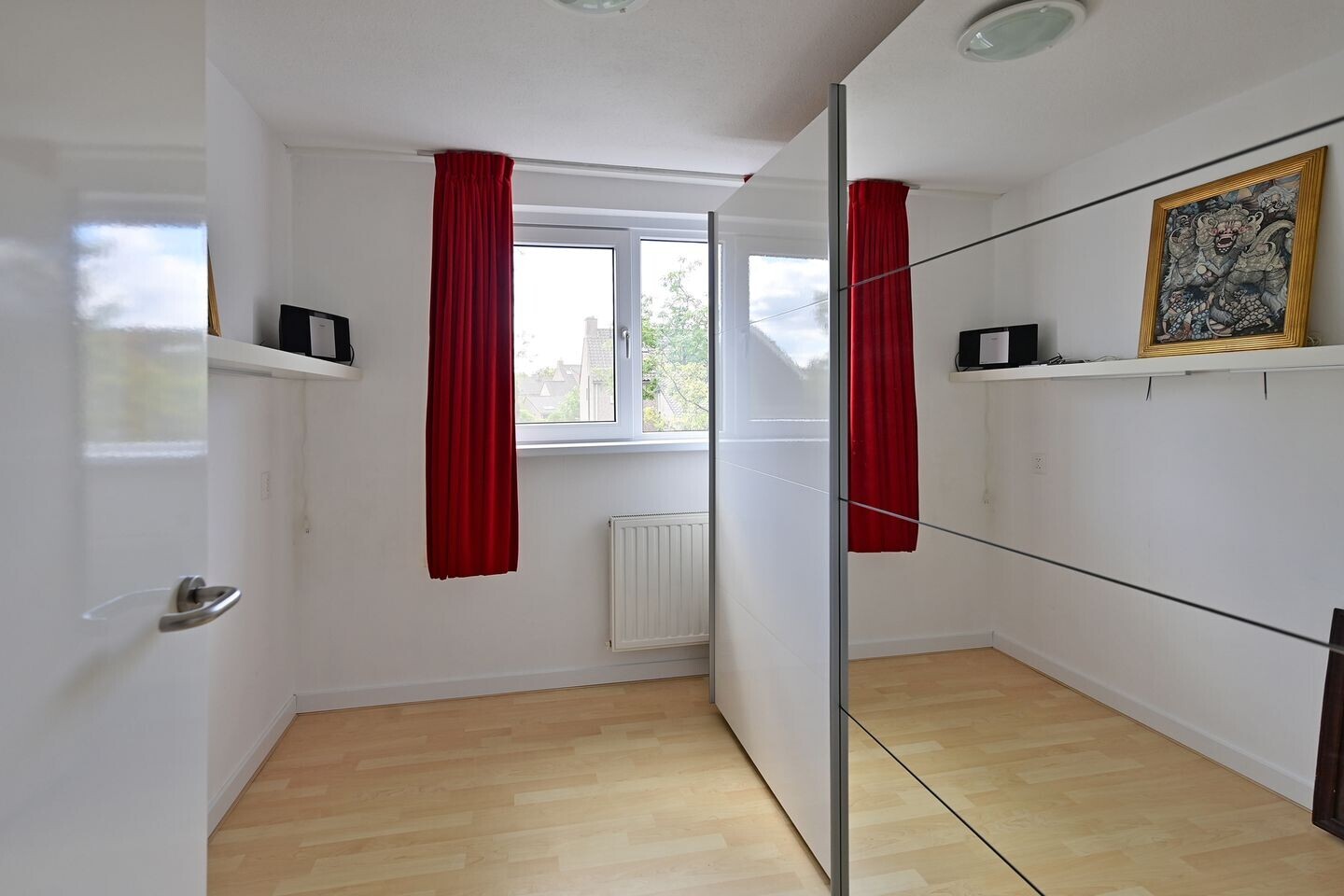 Tussenwoning te koop: Hoofdweg 50, Huizen