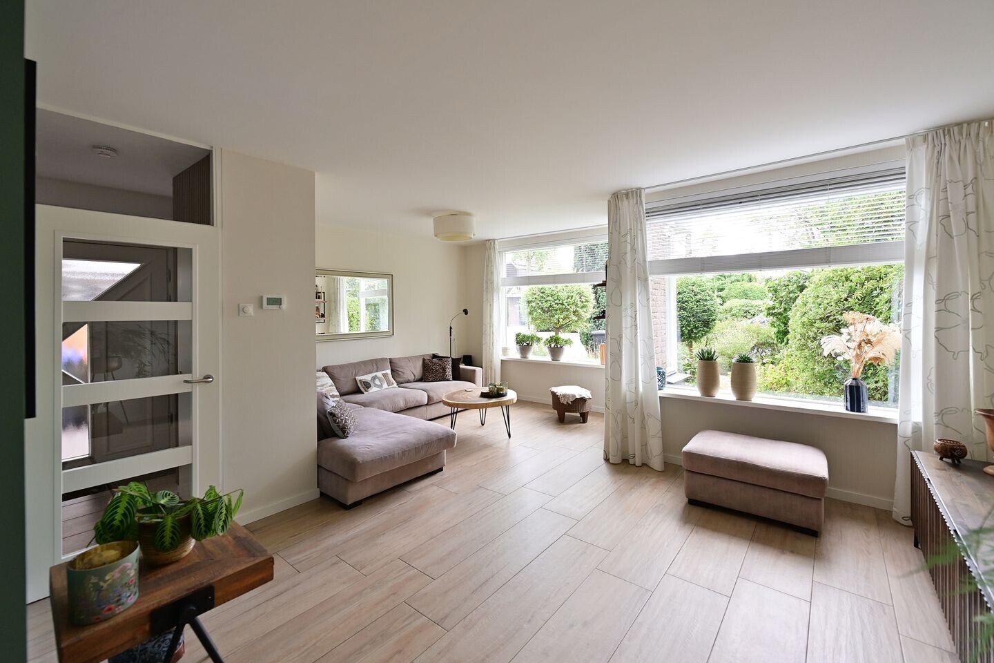 Tussenwoning te koop: Hoofdweg 50, Huizen