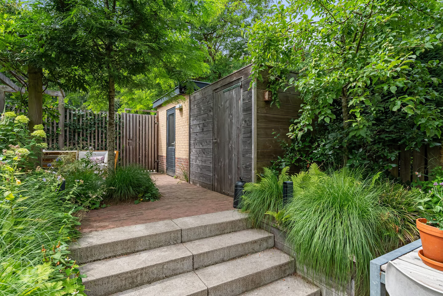 Tussenwoning te koop: Want 75, Huizen