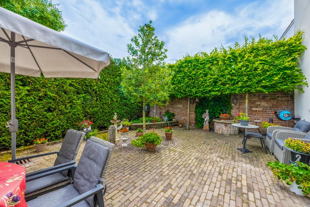Tussenwoning te koop: Gansoordstraat 10, Naarden
