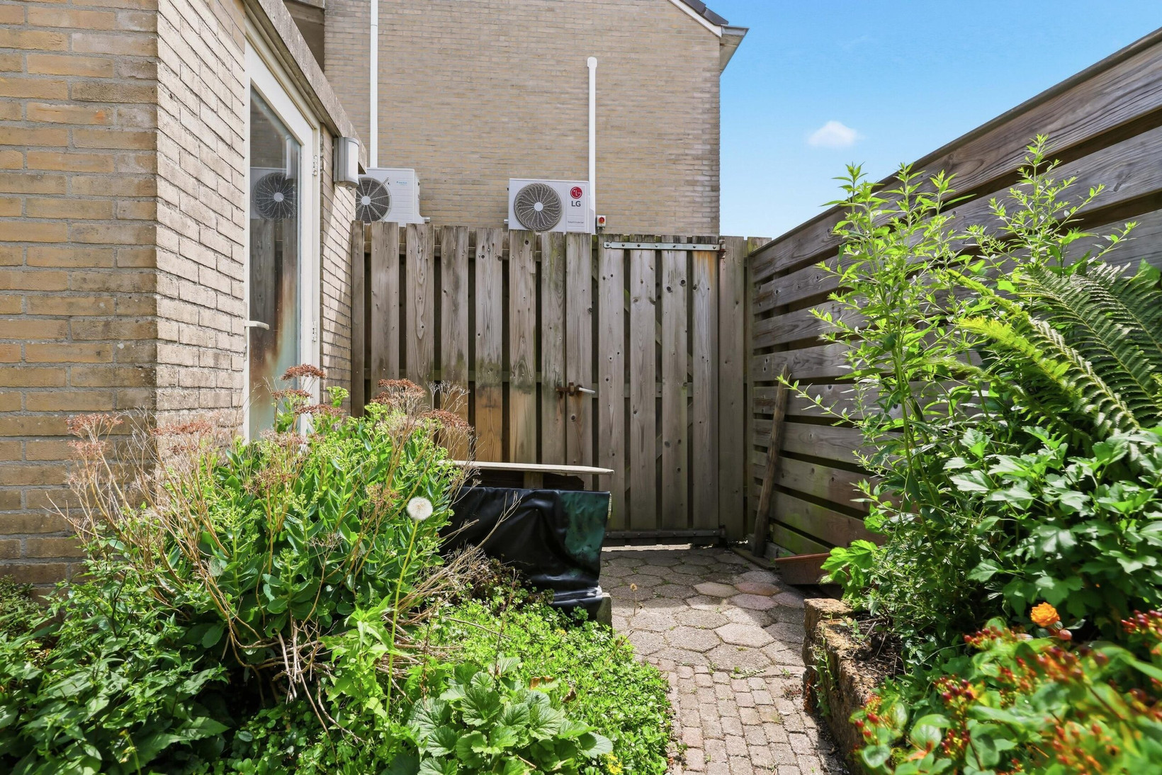 Tussenwoning te koop: Claude Debussystraat 56, Zaandijk