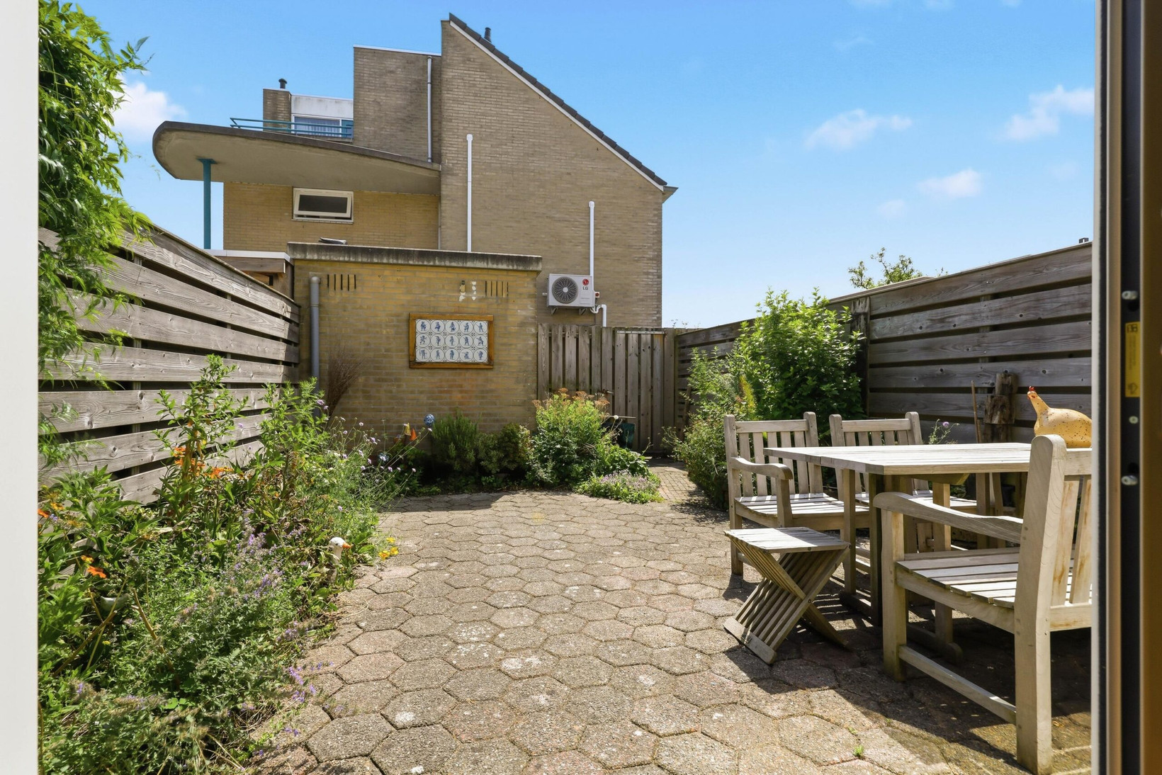 Tussenwoning te koop: Claude Debussystraat 56, Zaandijk
