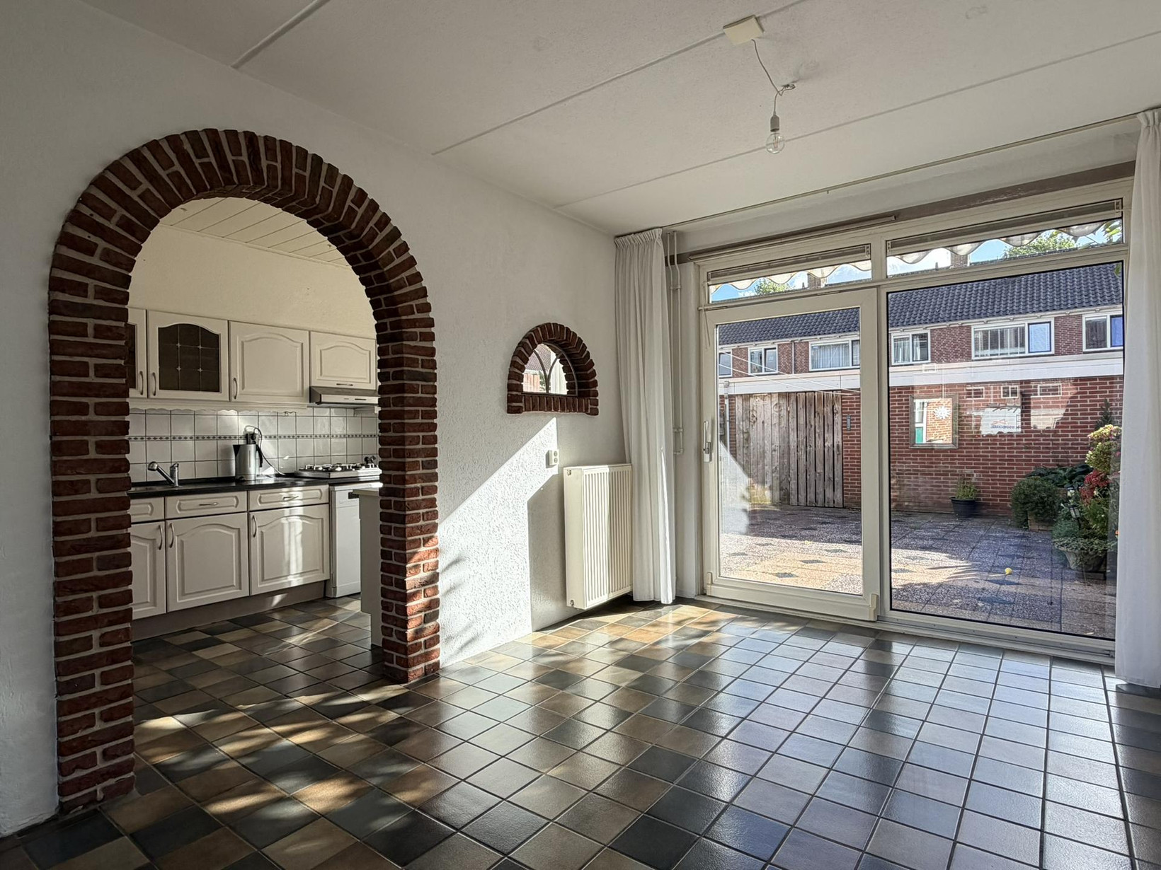 Tussenwoning te koop: Willem Andriessenweg 19, Bovenkarspel