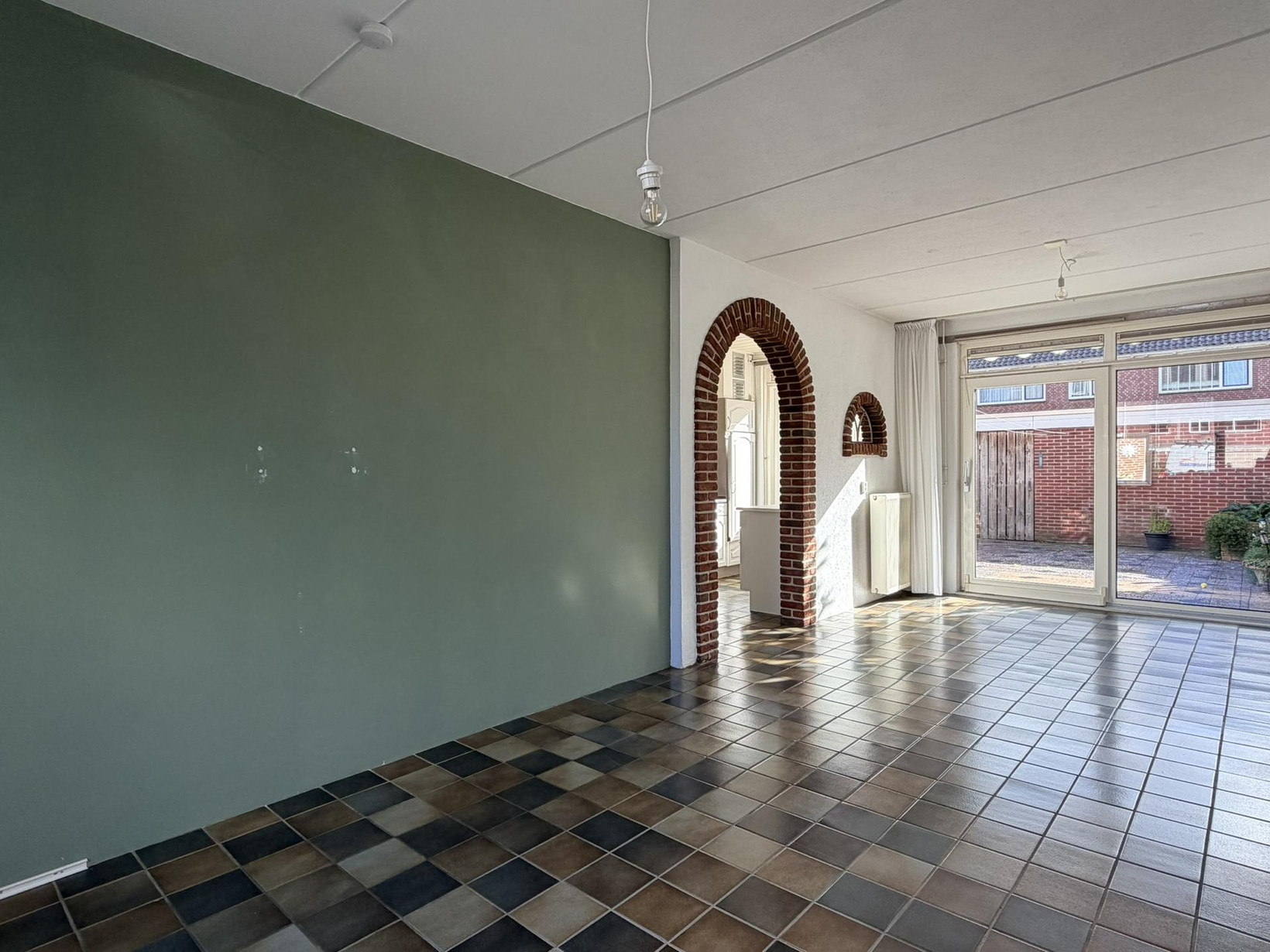 Tussenwoning te koop: Willem Andriessenweg 19, Bovenkarspel