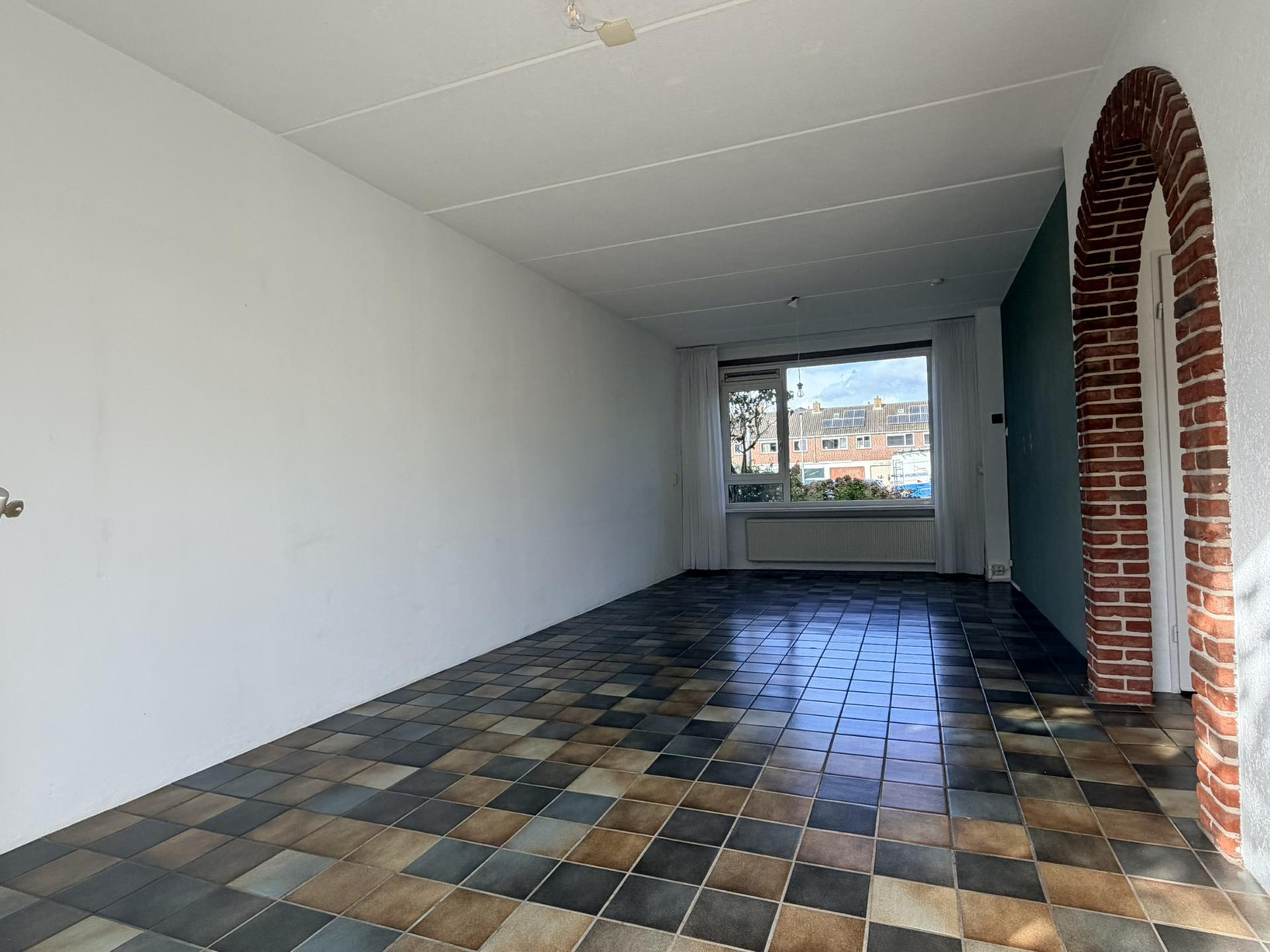 Tussenwoning te koop: Willem Andriessenweg 19, Bovenkarspel