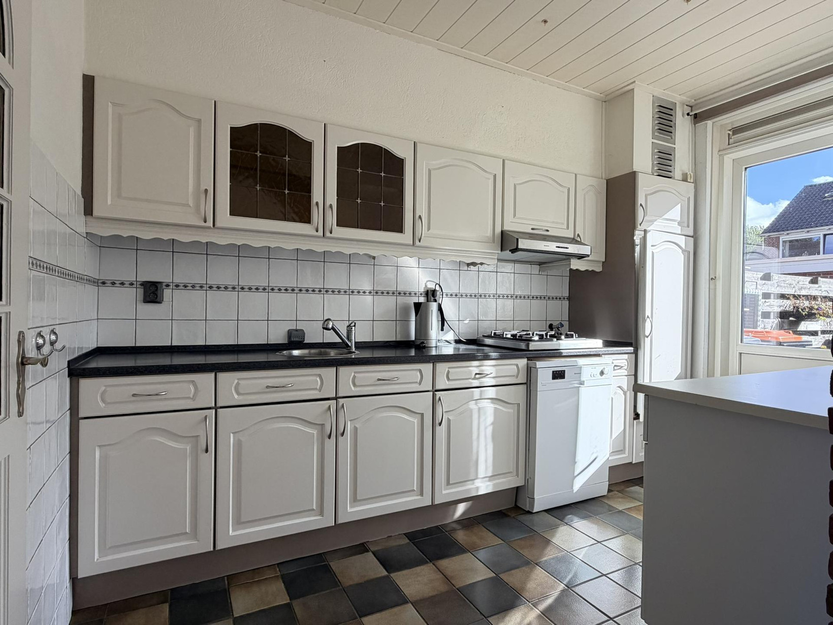 Tussenwoning te koop: Willem Andriessenweg 19, Bovenkarspel
