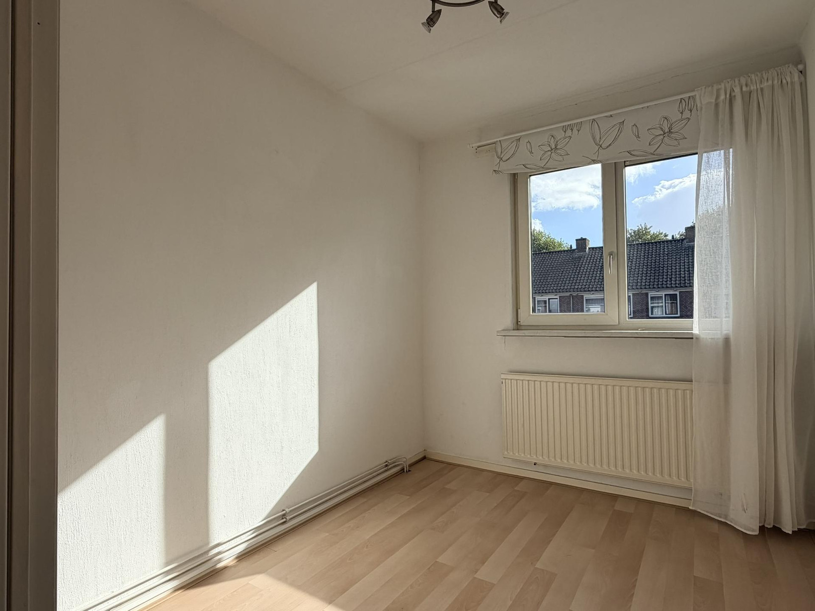 Tussenwoning te koop: Willem Andriessenweg 19, Bovenkarspel