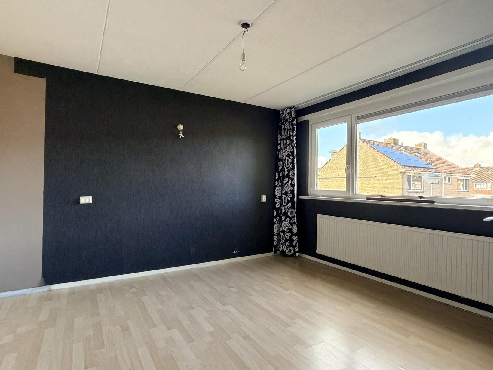 Tussenwoning te koop: Willem Andriessenweg 19, Bovenkarspel