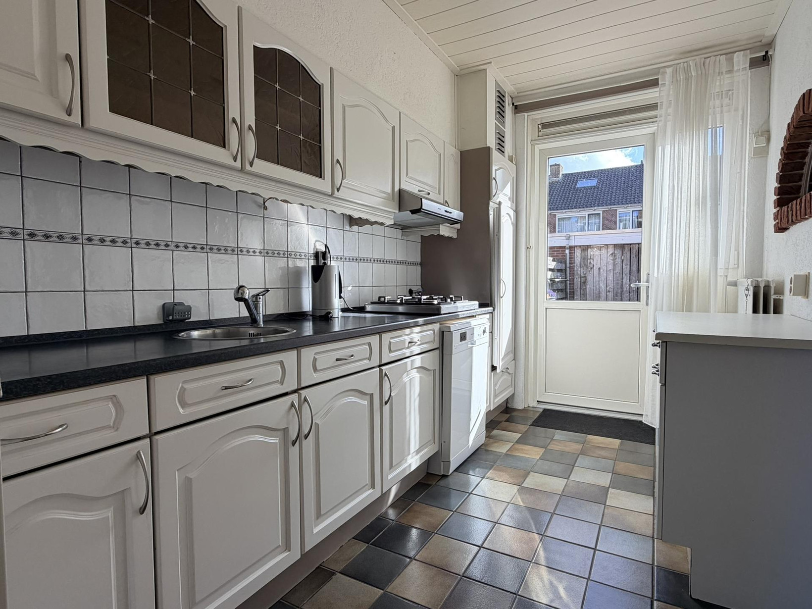Tussenwoning te koop: Willem Andriessenweg 19, Bovenkarspel