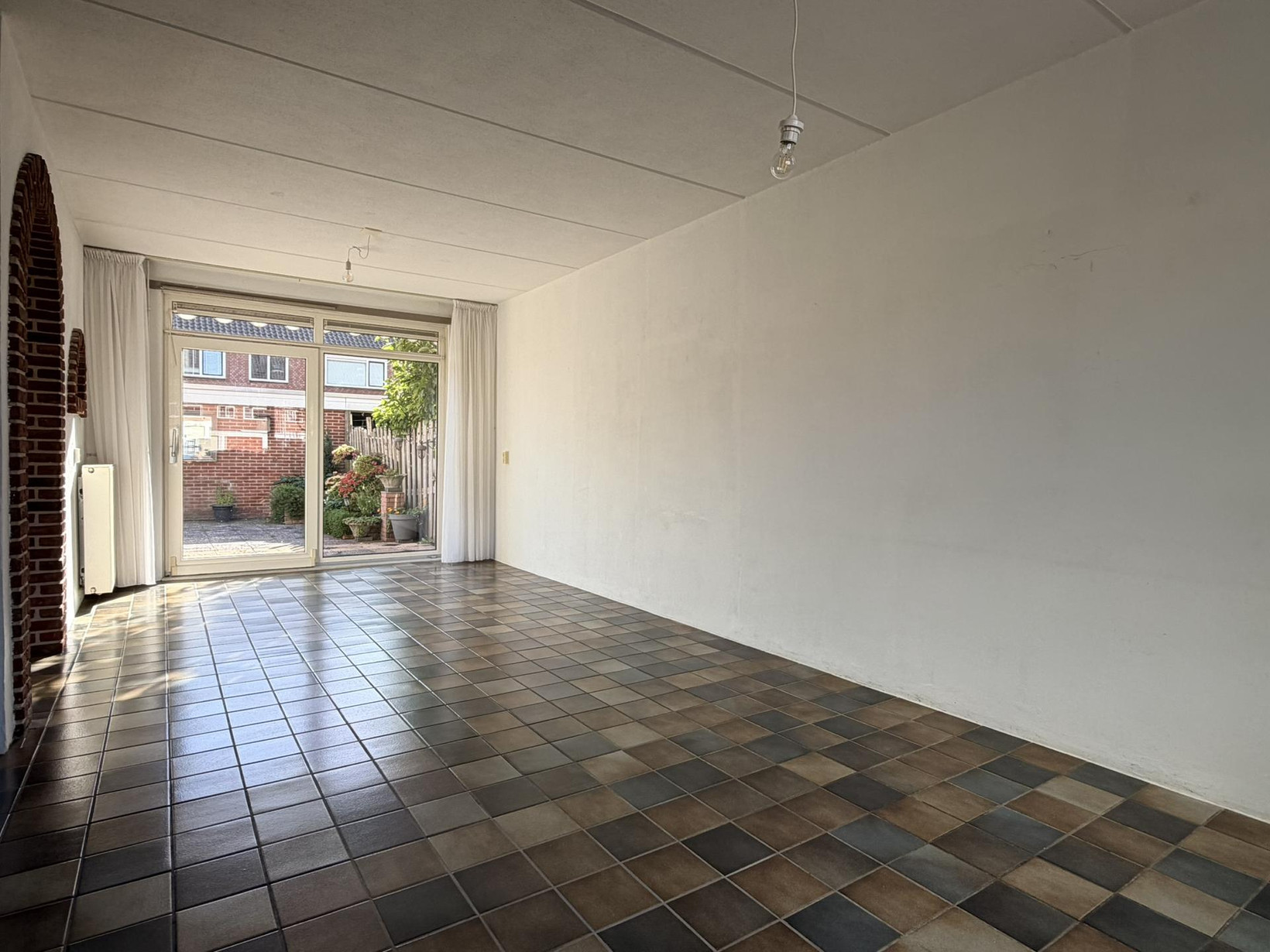 Tussenwoning te koop: Willem Andriessenweg 19, Bovenkarspel