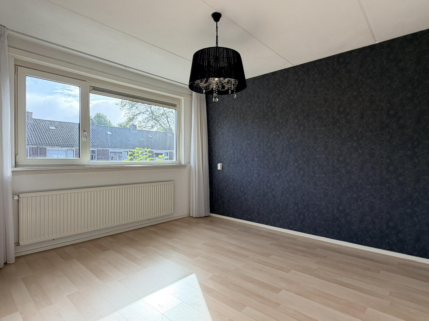 Tussenwoning te koop: Willem Andriessenweg 19, Bovenkarspel