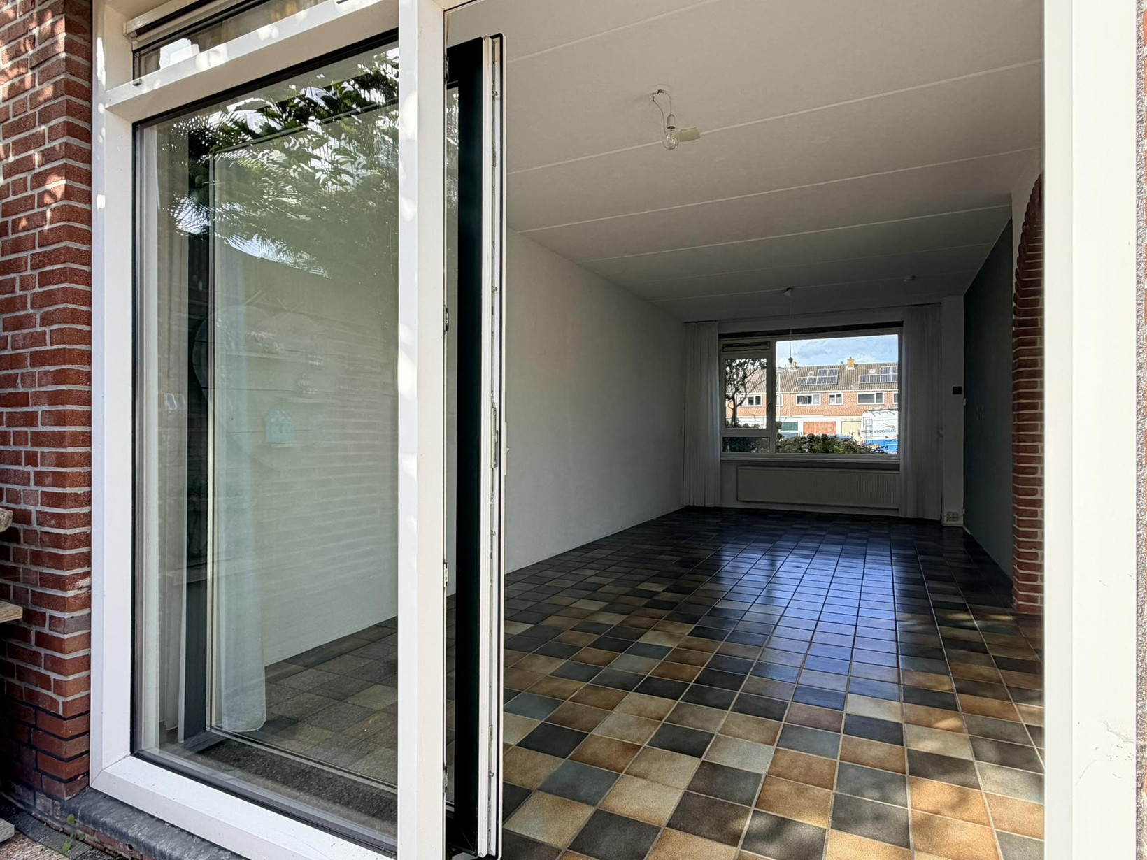 Tussenwoning te koop: Willem Andriessenweg 19, Bovenkarspel