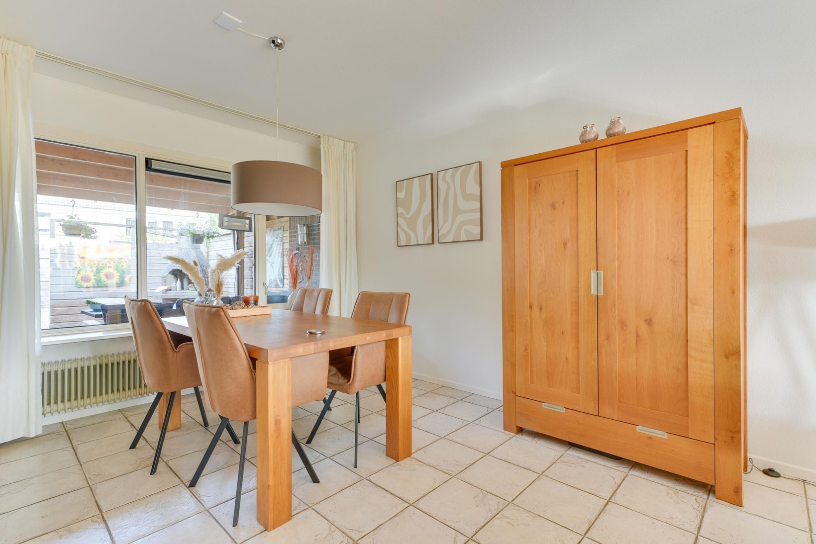 Tussenwoning te koop: Versproncklaan 11, Heerhugowaard