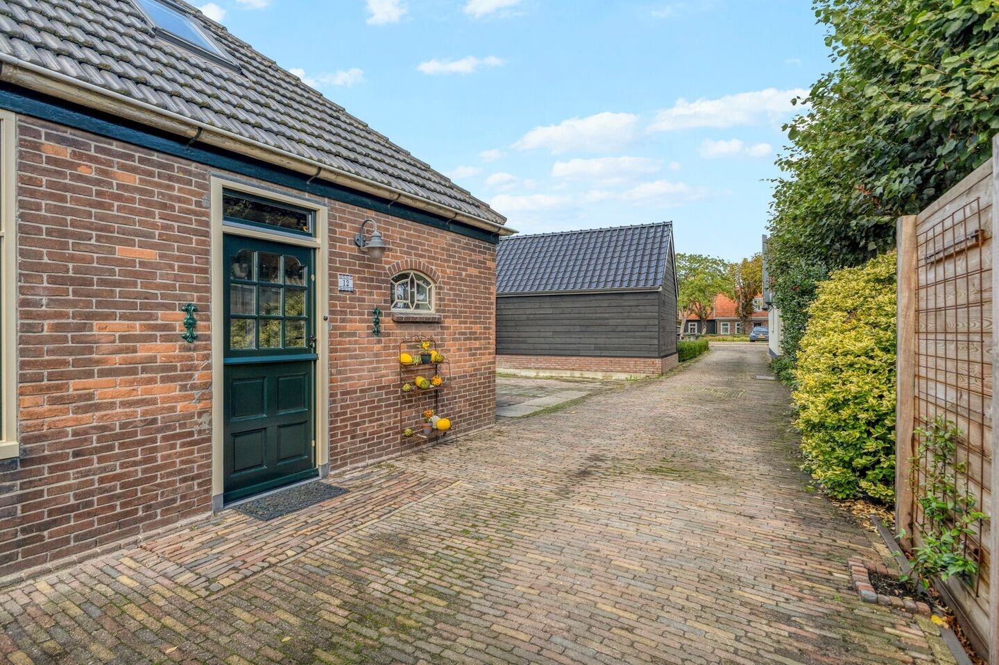 Vrijstaande woning te koop: Kerkbuurt 12, Tuitjenhorn