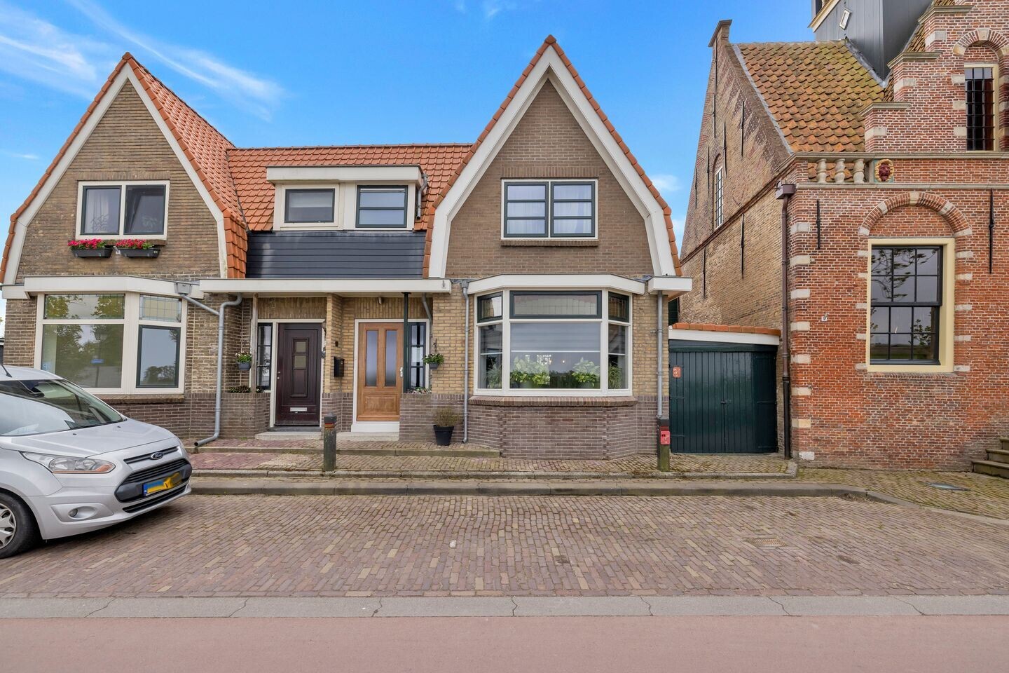 Tussenwoning te koop: Heerenweg 152, Barsingerhorn