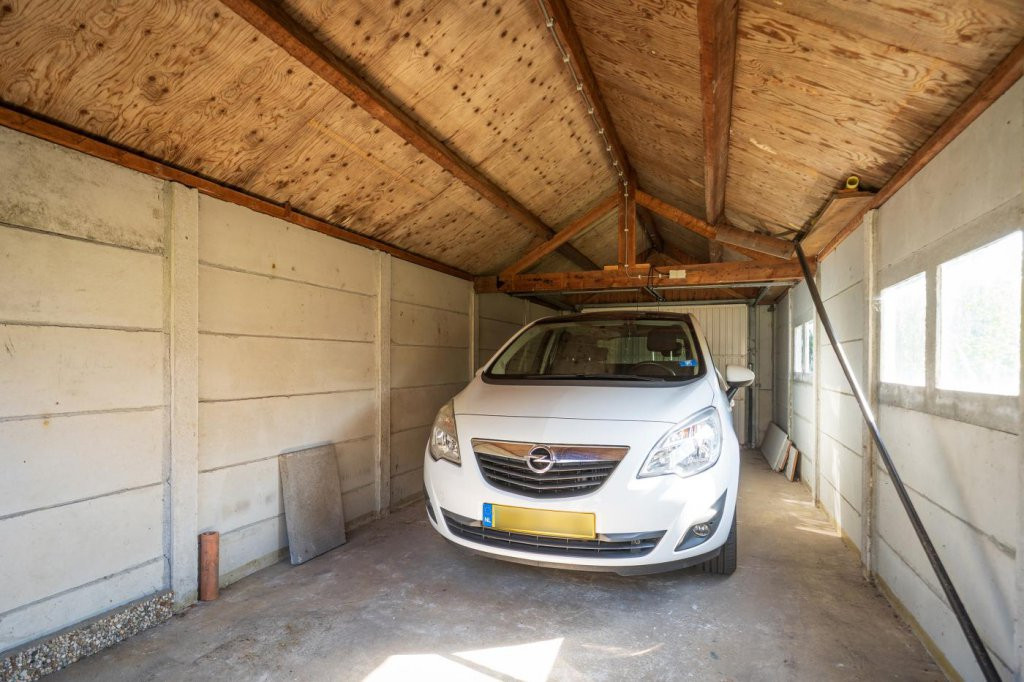 Tussenwoning te koop: Wilhelminalaan 84, Den Burg