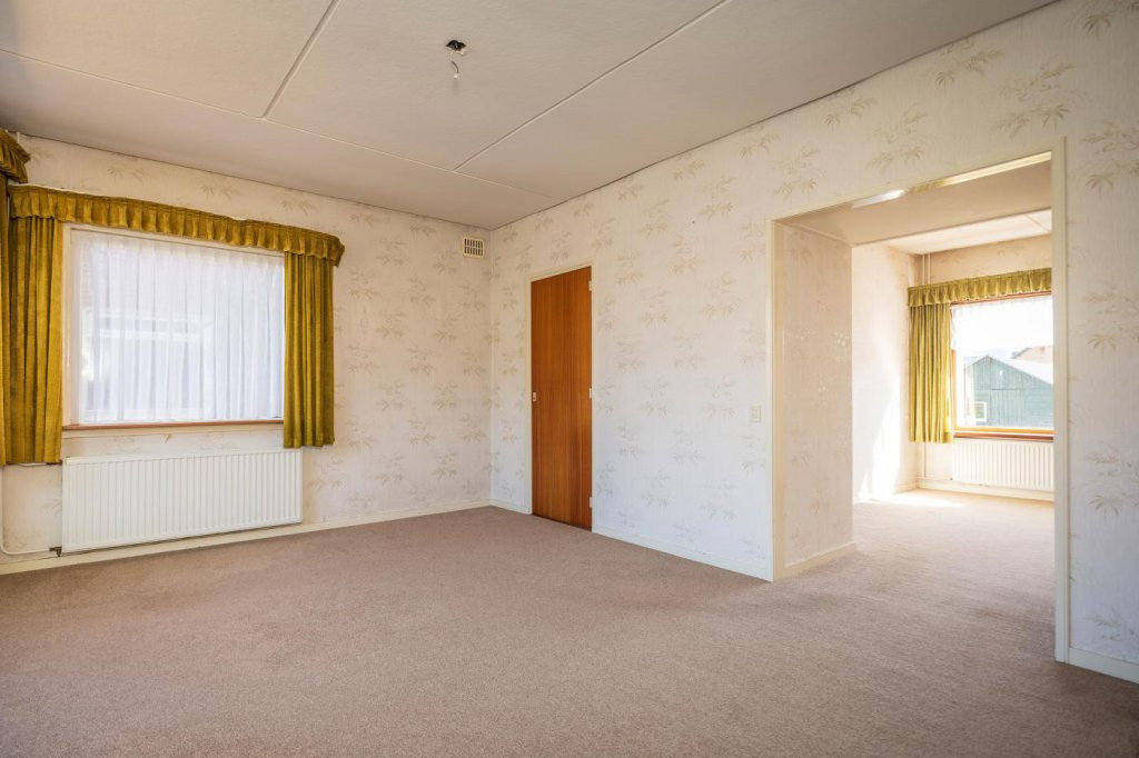 Tussenwoning te koop: Wilhelminalaan 84, Den Burg