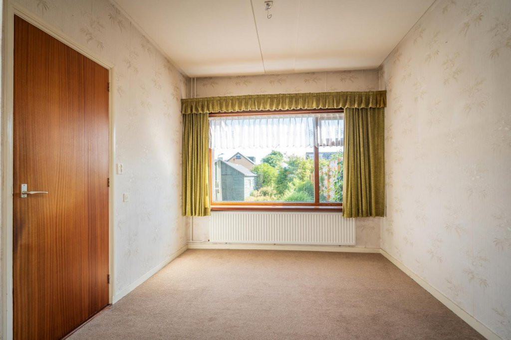 Tussenwoning te koop: Wilhelminalaan 84, Den Burg