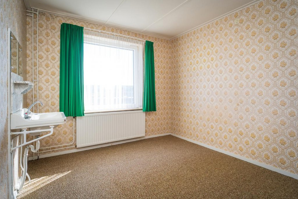 Tussenwoning te koop: Wilhelminalaan 84, Den Burg