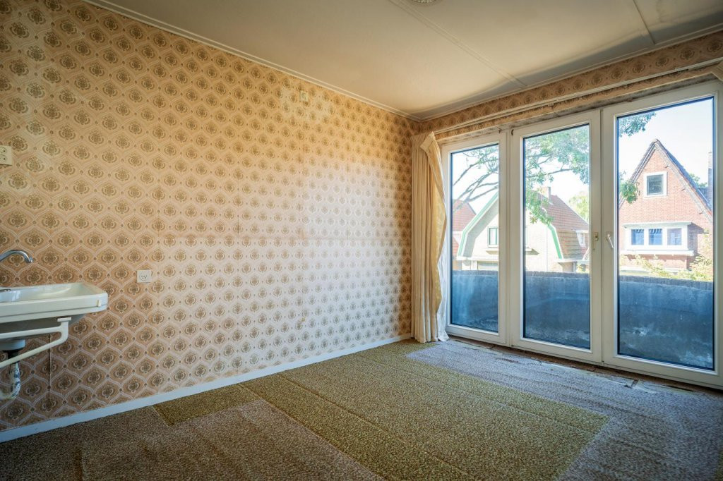 Tussenwoning te koop: Wilhelminalaan 84, Den Burg