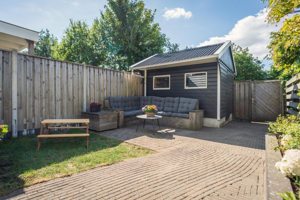 Tussenwoning te koop: Schoudieck 47, Den Burg