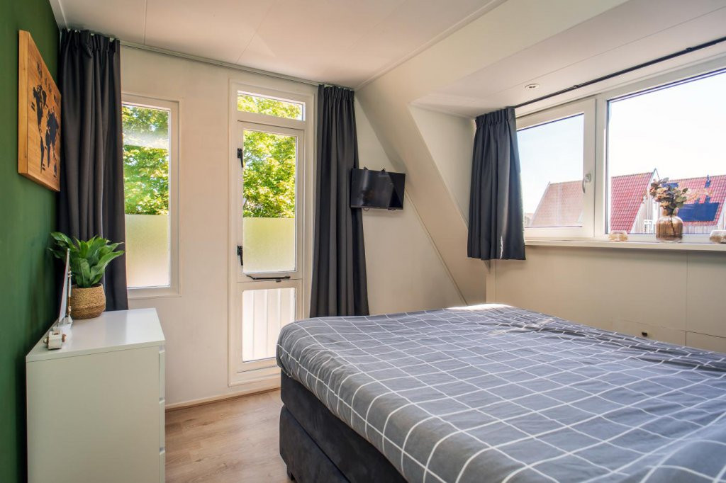 Tussenwoning te koop: Schoudieck 47, Den Burg