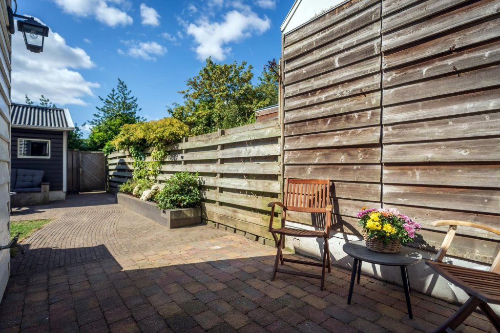 Tussenwoning te koop: Schoudieck 47, Den Burg