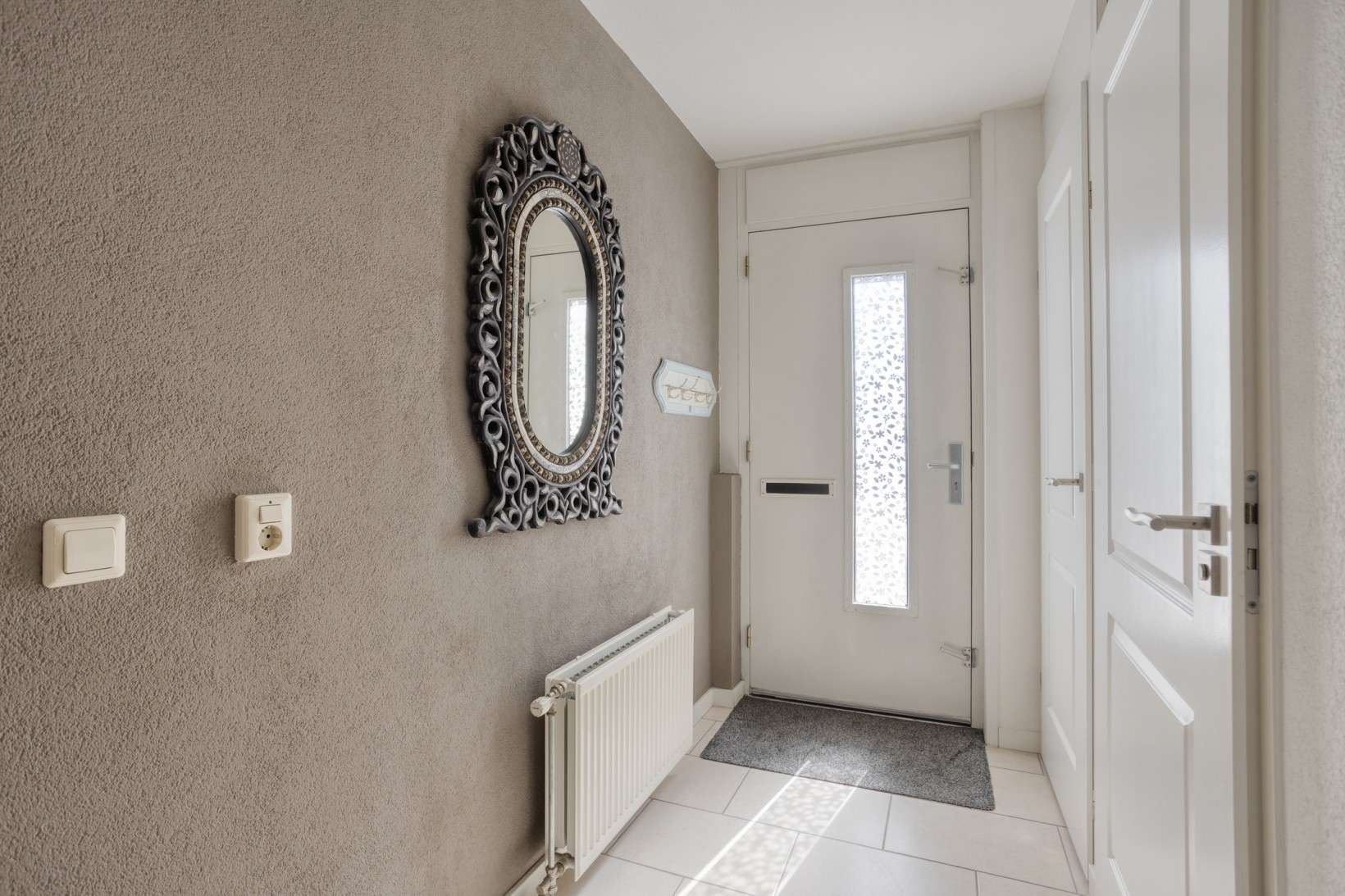 Tussenwoning te koop: Fien de la Marstraat 52, Castricum