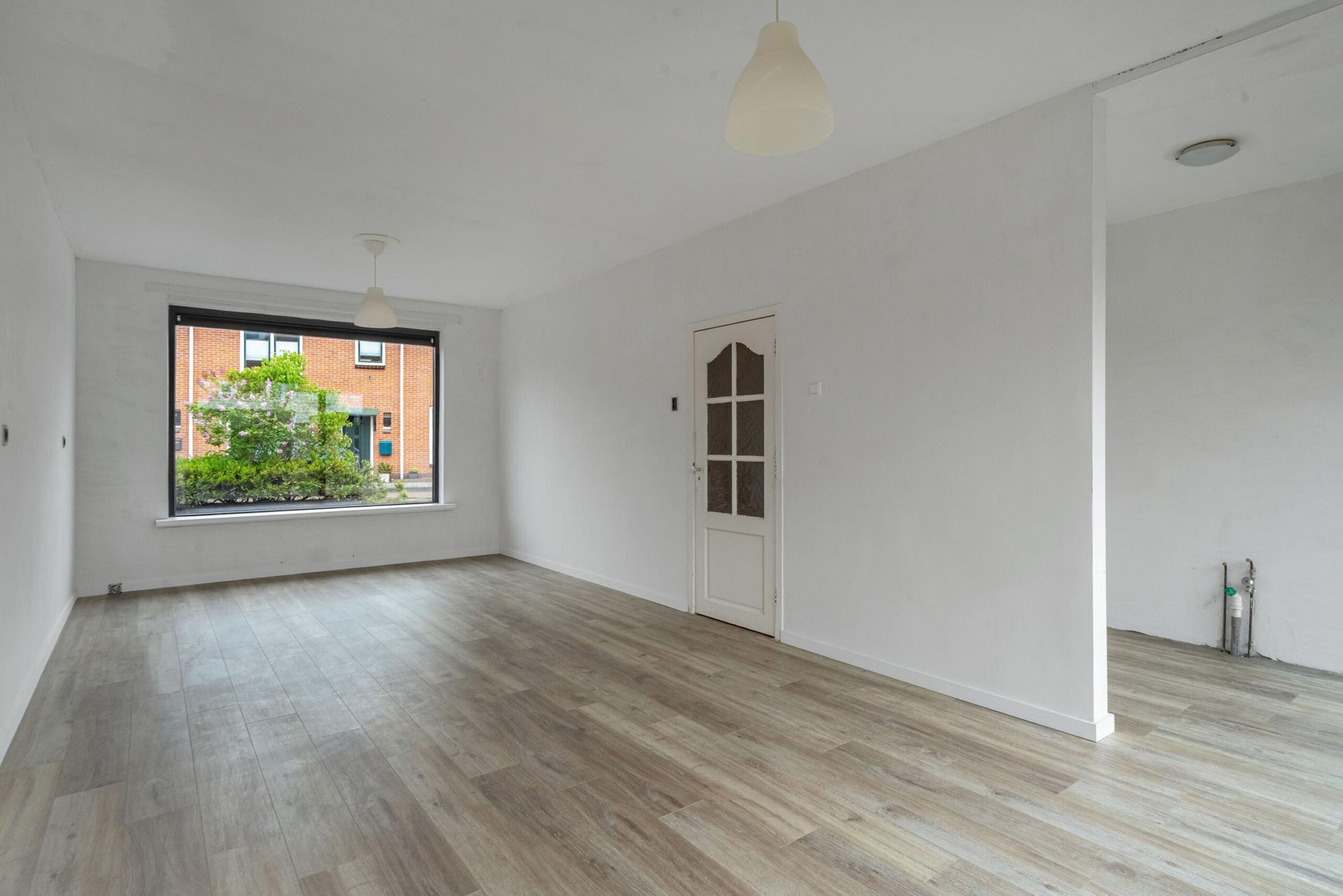 Tussenwoning te koop: Ladderbeekstraat 33, Velsen-Noord