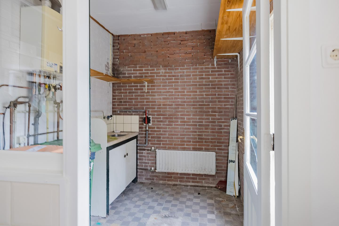 Tussenwoning te koop: Kompasstraat 39, Ijmuiden