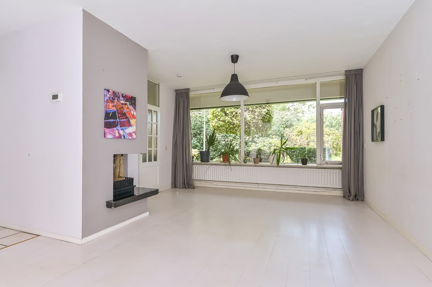 Tussenwoning te koop: Minister van Houtenlaan 4, Velsen-Zuid