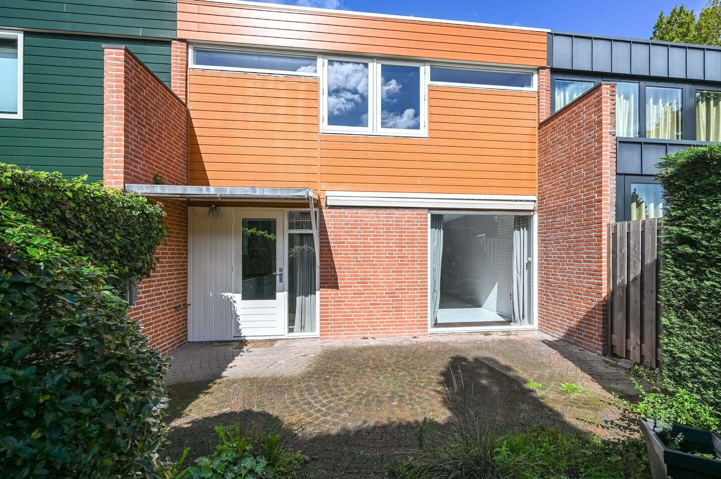 Tussenwoning te koop: Minister van Houtenlaan 4, Velsen-Zuid