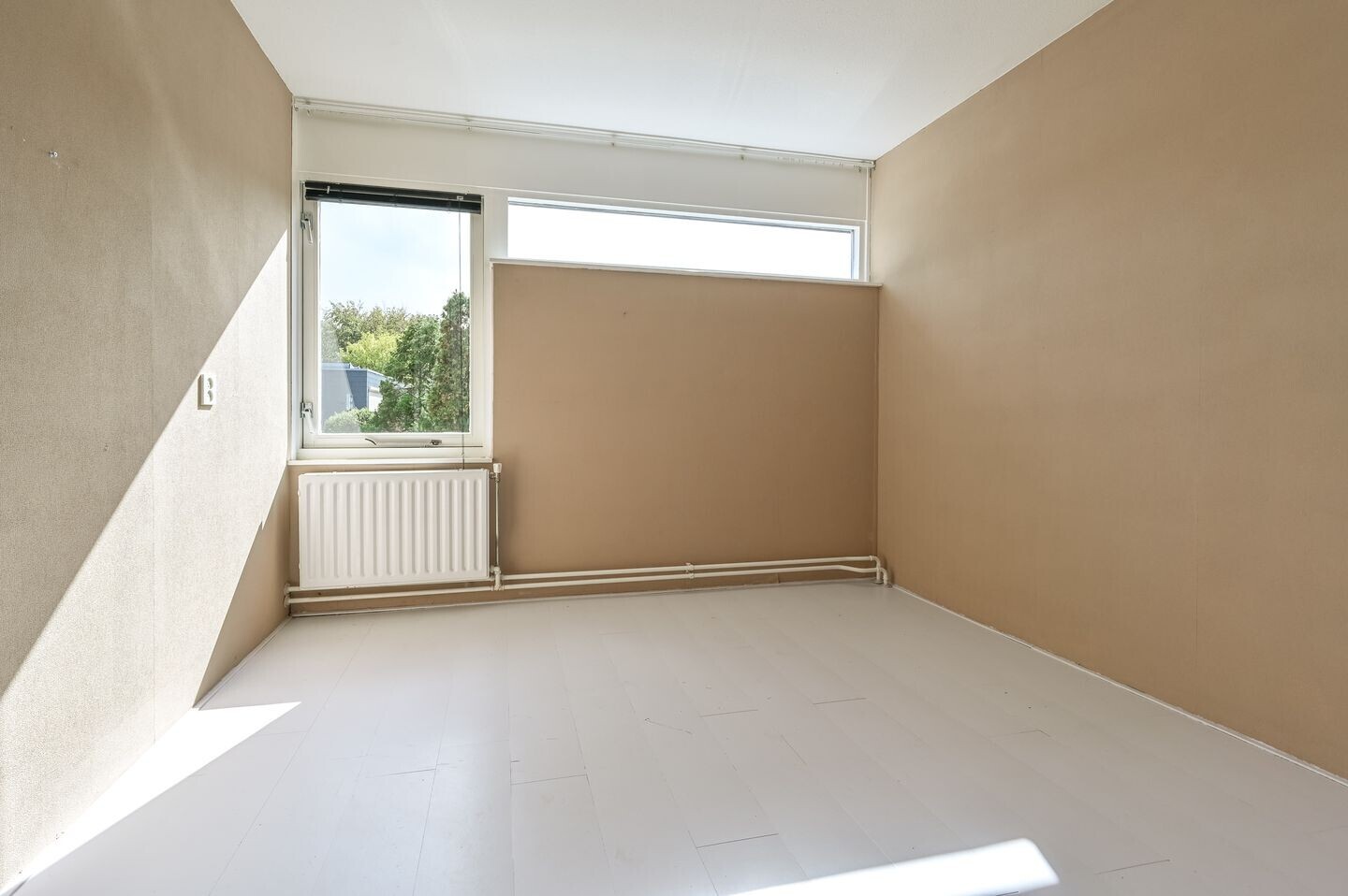 Tussenwoning te koop: Minister van Houtenlaan 4, Velsen-Zuid
