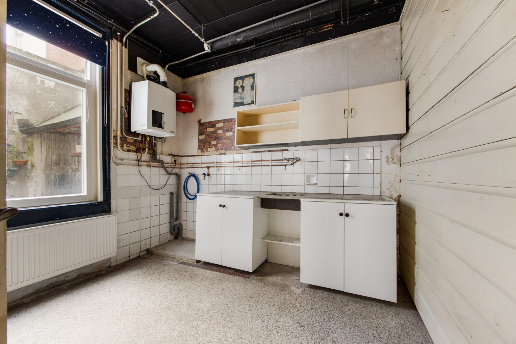 Tussenwoning te koop: Lange Herenstraat 50, Haarlem