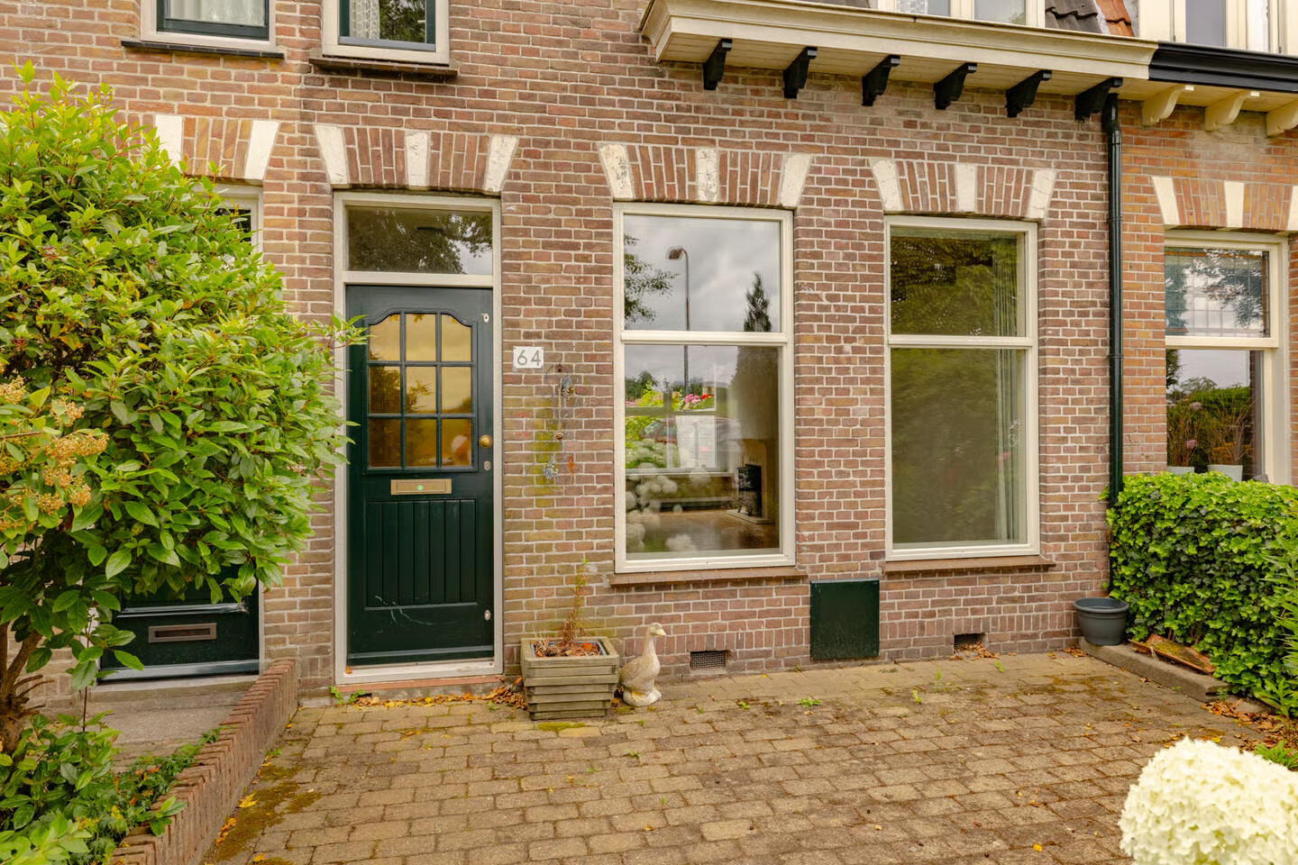 Tussenwoning te koop: Slaperdijkweg 64, Haarlem