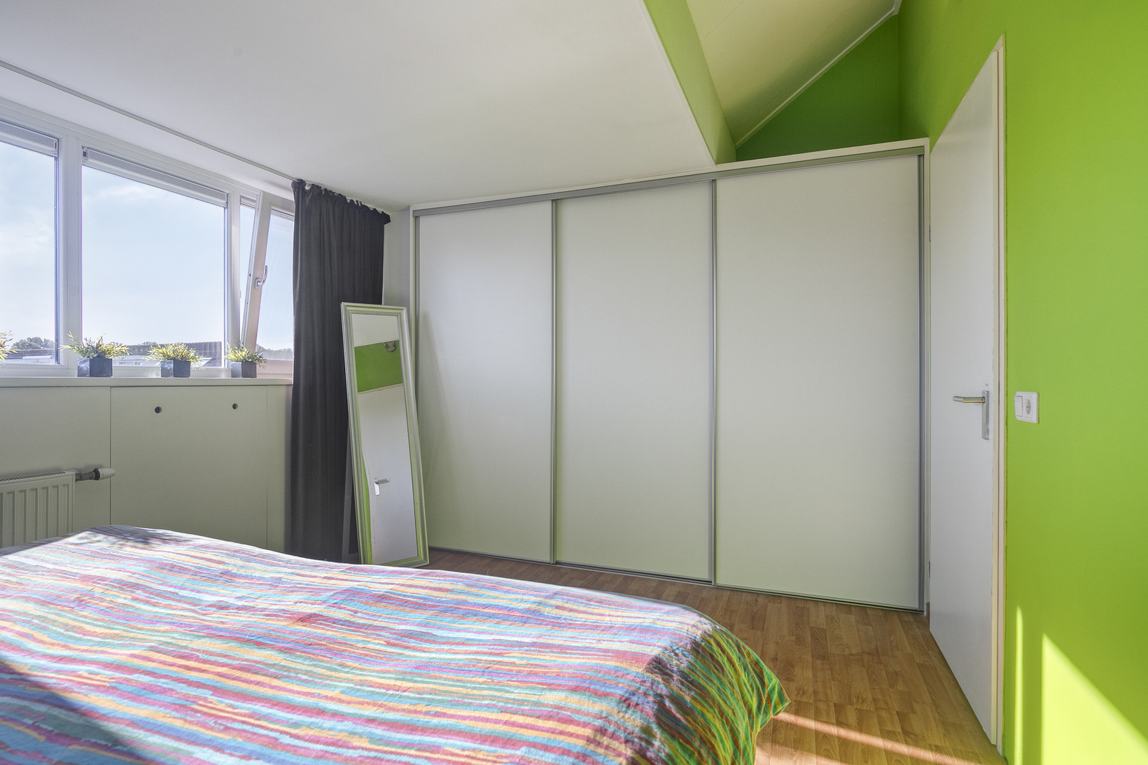 Tussenwoning te koop: Paganiniplantsoen 47, Nieuw-Vennep