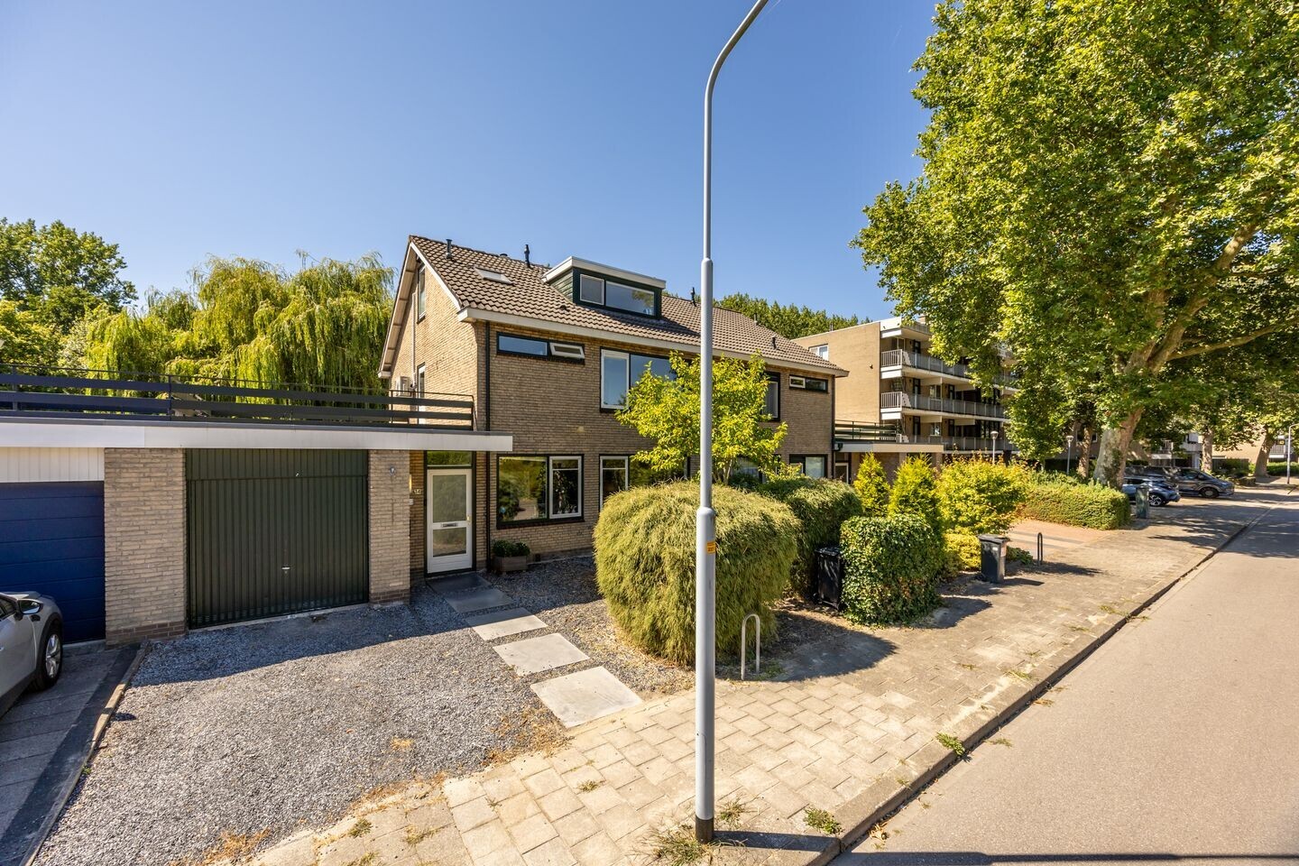 Tussenwoning te koop: Weegbreestraat 34, Nieuw-Vennep