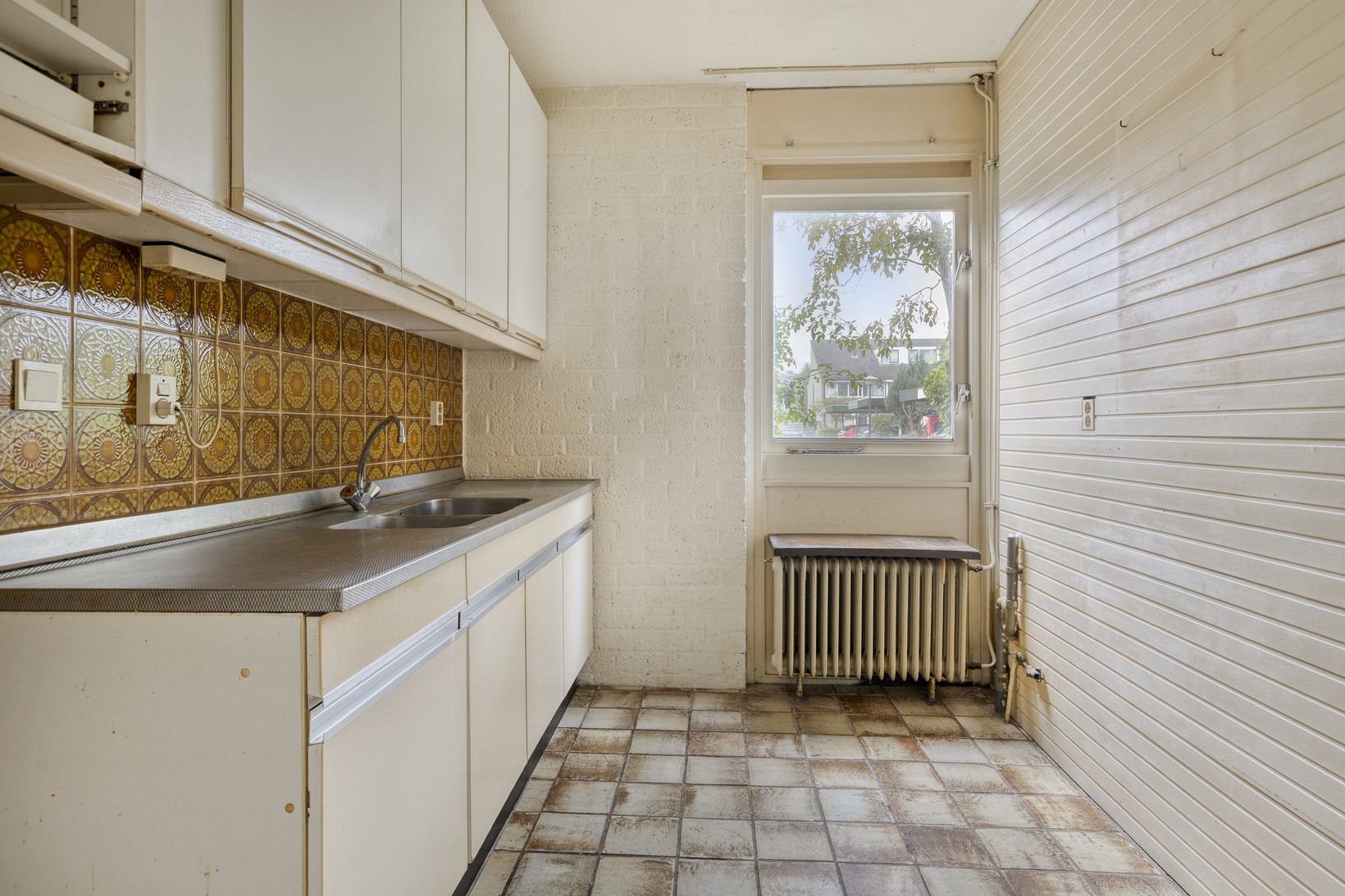 Tussenwoning te koop: Tjalkenwerf 24, Leiden